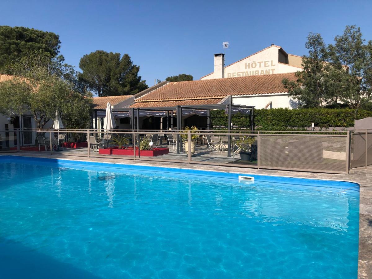Logis Hotel Restaurant Les Aubuns Caissargues Buitenkant foto