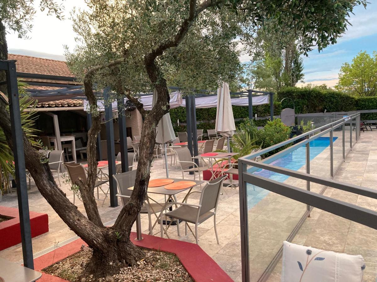Logis Hotel Restaurant Les Aubuns Caissargues Buitenkant foto