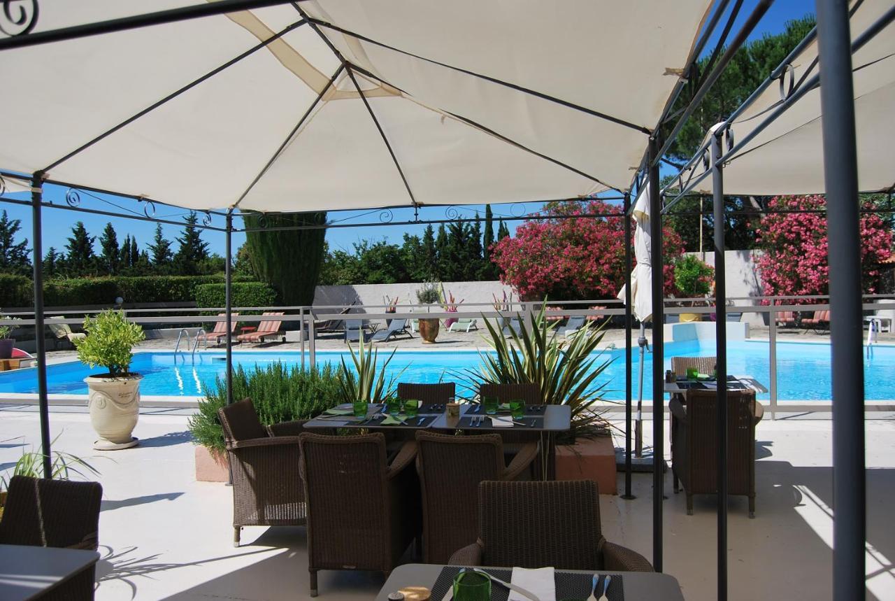 Logis Hotel Restaurant Les Aubuns Caissargues Buitenkant foto