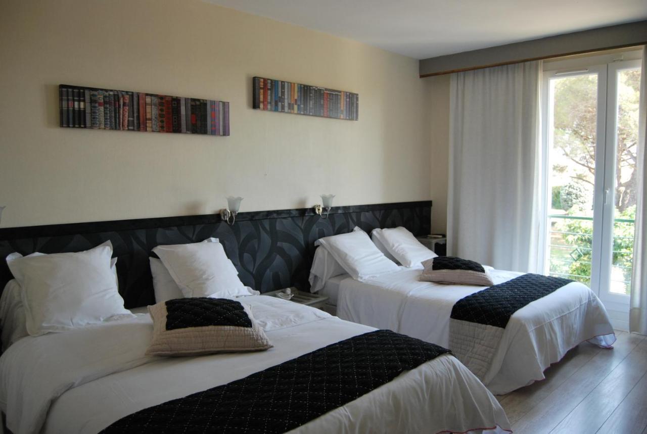 Logis Hotel Restaurant Les Aubuns Caissargues Kamer foto